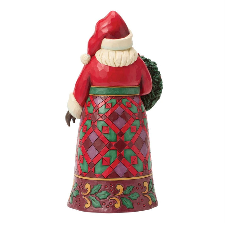 Jim Shore Santa With Wreath & Poinsettia Figurine