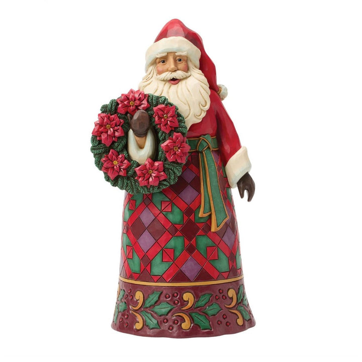 Jim Shore Santa With Wreath & Poinsettia Figurine